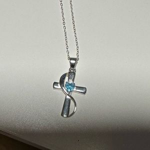 Straight from the heart sterling silver cross with blue stone faith hope love